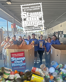 Eagle Staff Showing support on Stamp Out Hunger Food Drive